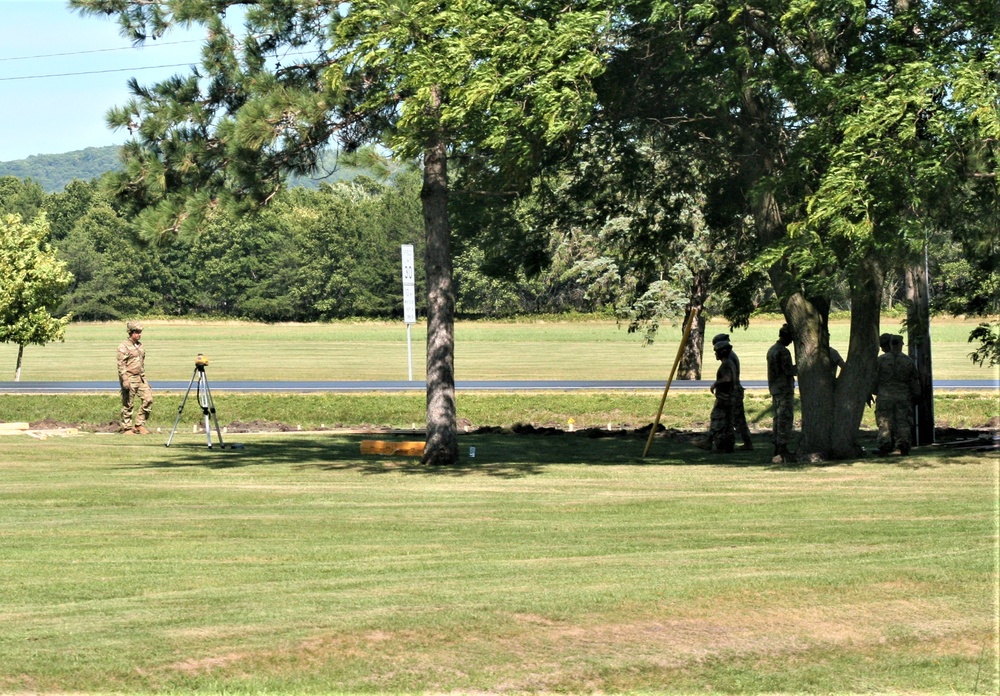 Army Reserve engineer unit training in CSTX 86-23-02 helps complete sidewalk project at Fort McCoy