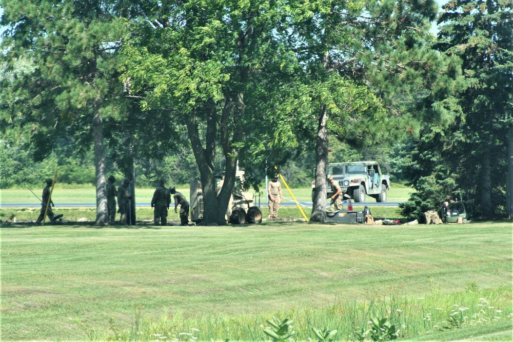 Army Reserve engineer unit training in CSTX 86-23-02 helps complete sidewalk project at Fort McCoy