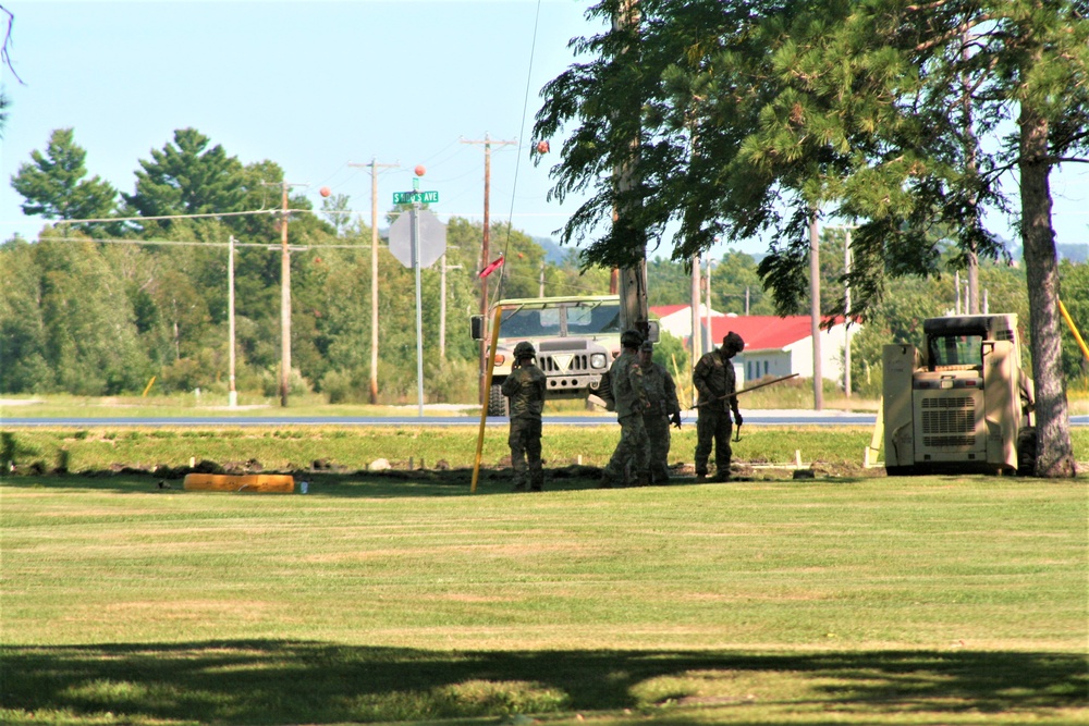 Army Reserve engineer unit training in CSTX 86-23-02 helps complete sidewalk project at Fort McCoy