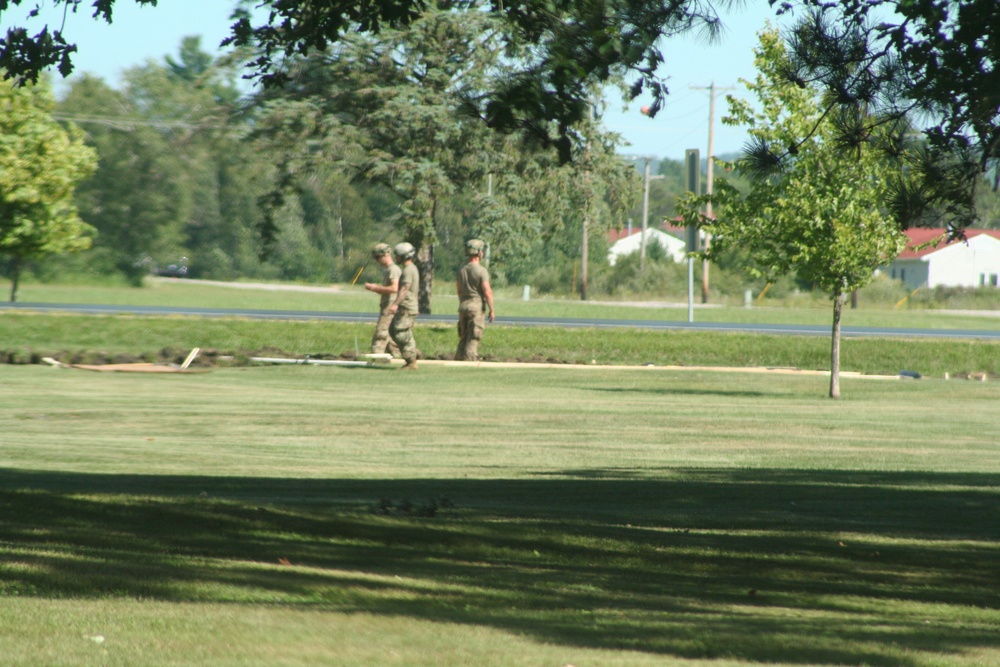 Army Reserve engineer unit training in CSTX 86-23-02 helps complete sidewalk project at Fort McCoy