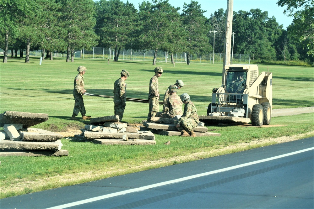 Army Reserve engineer unit training in CSTX 86-23-02 helps complete sidewalk project at Fort McCoy