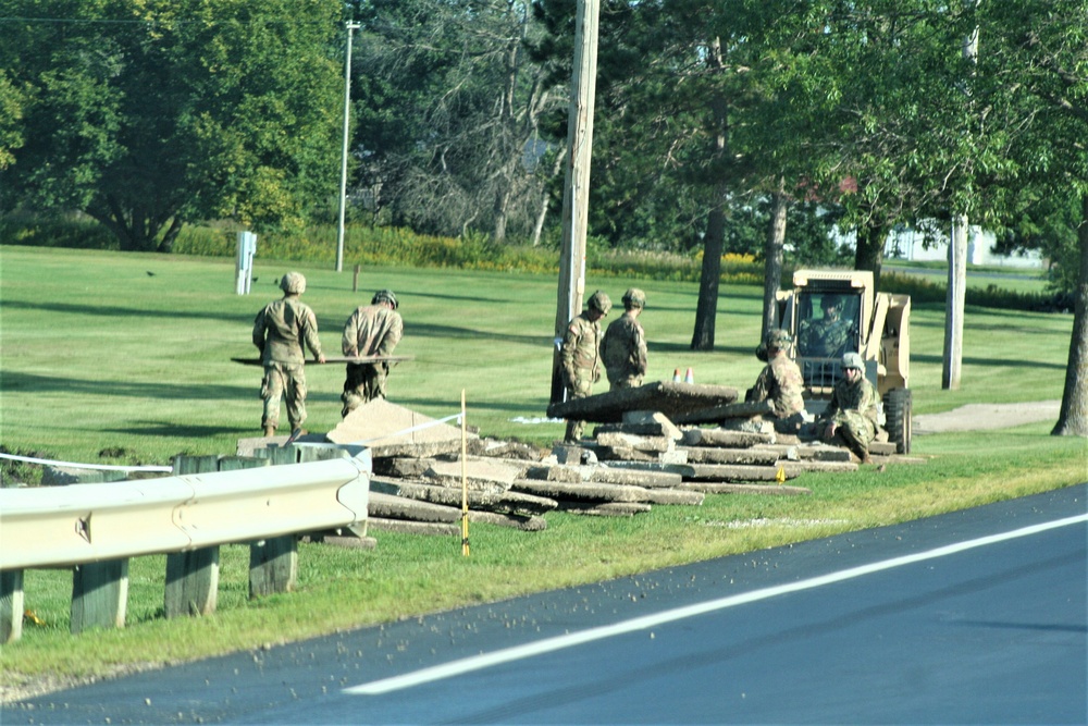 Army Reserve engineer unit training in CSTX 86-23-02 helps complete sidewalk project at Fort McCoy