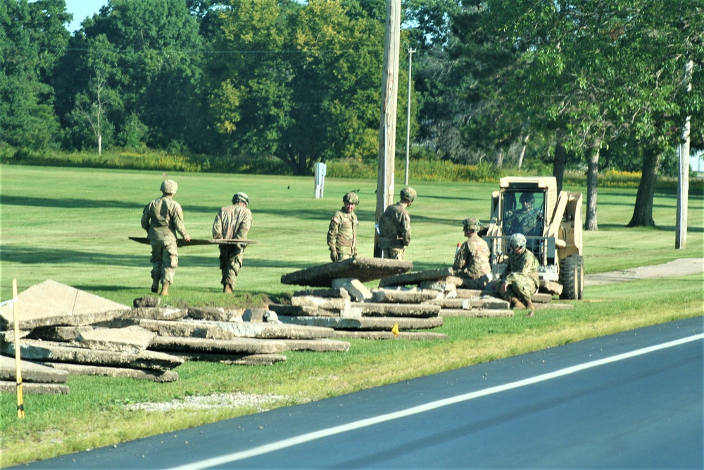 Army Reserve engineer unit training in CSTX 86-23-02 helps complete sidewalk project at Fort McCoy