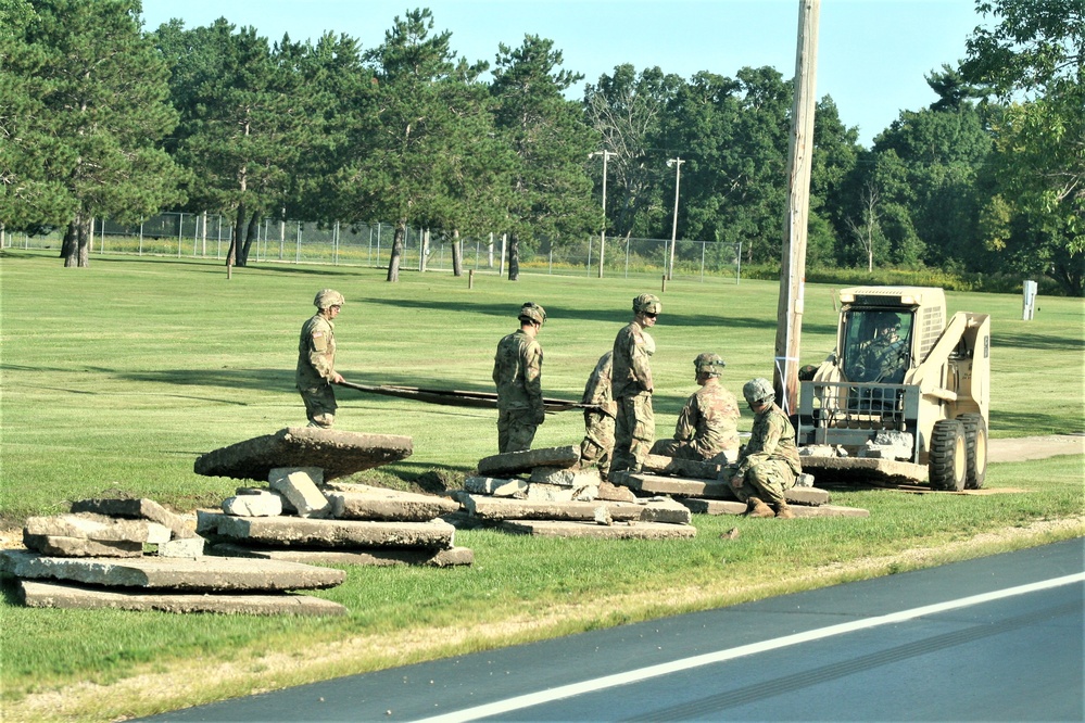 Army Reserve engineer unit training in CSTX 86-23-02 helps complete sidewalk project at Fort McCoy