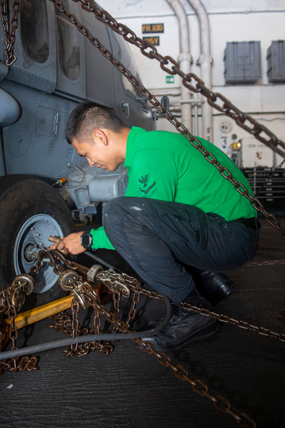 Sailor Performs Maintenance