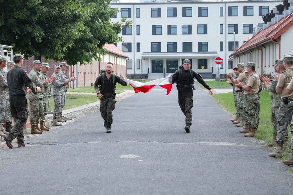 Multinational troops with NATO’s enhanced Forward Presence Battle Group Poland participate in Norwegian Foot March