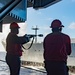 USS Ronald Reagan (CVN 76) conducts replenishment-at-sea with USNS Yukon (T-AO 202) and USNS Carl Brashear (T-AKE 7)