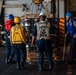 USS Ronald Reagan (CVN 76) conducts replenishment-at-sea with USNS Yukon (T-AO 202) and USNS Carl Brashear (T-AKE 7)