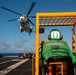 USS Ronald Reagan (CVN 76) conducts replenishment-at-sea with USNS Yukon (T-AO 202) and USNS Carl Brashear (T-AKE 7)