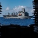 USS Ronald Reagan (CVN 76) conducts replenishment-at-sea with USNS Yukon (T-AO 202) and USNS Carl Brashear (T-AKE 7)