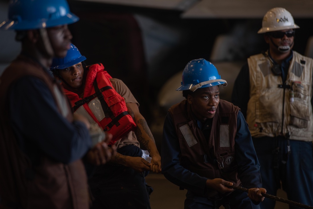 USS Ronald Reagan (CVN 76) conducts replenishment-at-sea with USNS Yukon (T-AO 202) and USNS Carl Brashear (T-AKE 7)