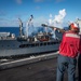 USS Ronald Reagan (CVN 76) conducts replenishment-at-sea with USNS Yukon (T-AO 202) and USNS Carl Brashear (T-AKE 7)