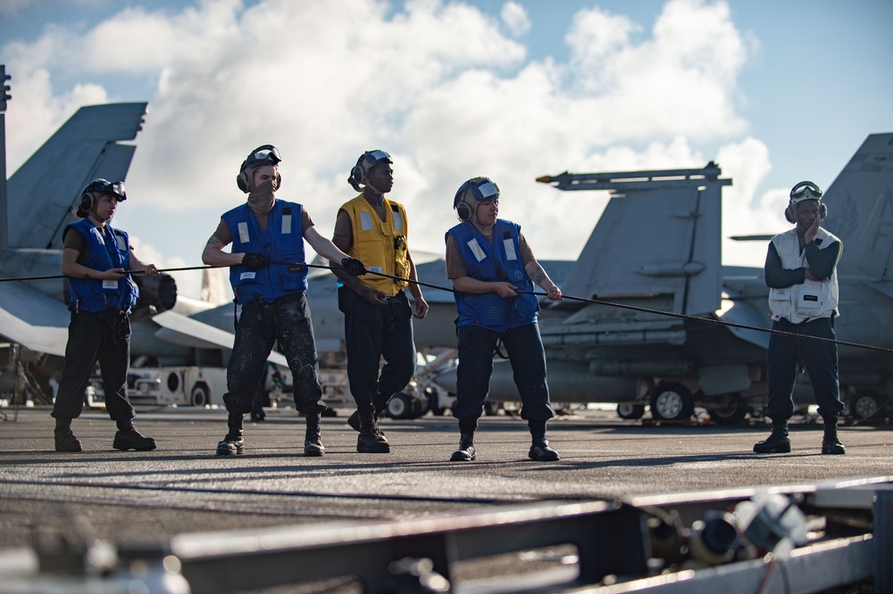 USS Ronald Reagan (CVN 76) conducts replenishment-at-sea with USNS Yukon (T-AO 202) and USNS Carl Brashear (T-AKE 7)