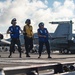 USS Ronald Reagan (CVN 76) conducts replenishment-at-sea with USNS Yukon (T-AO 202) and USNS Carl Brashear (T-AKE 7)