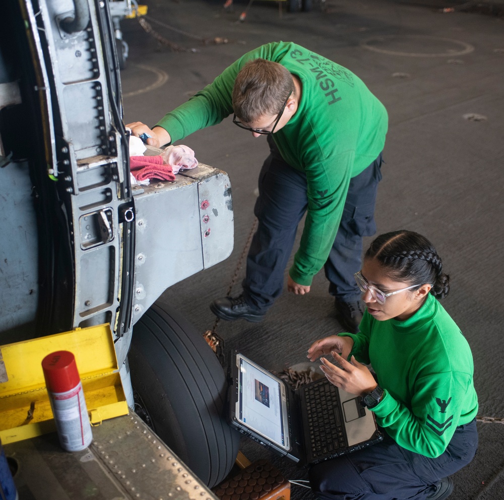 Sailors Perform Maintenance