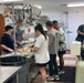 Sailors Volunteer to Help Feed Less Fortunate in San Angelo