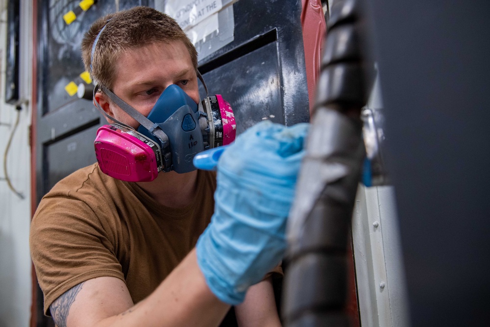 USS Ronald Reagan (CVN 76) Sailors preserve spaces