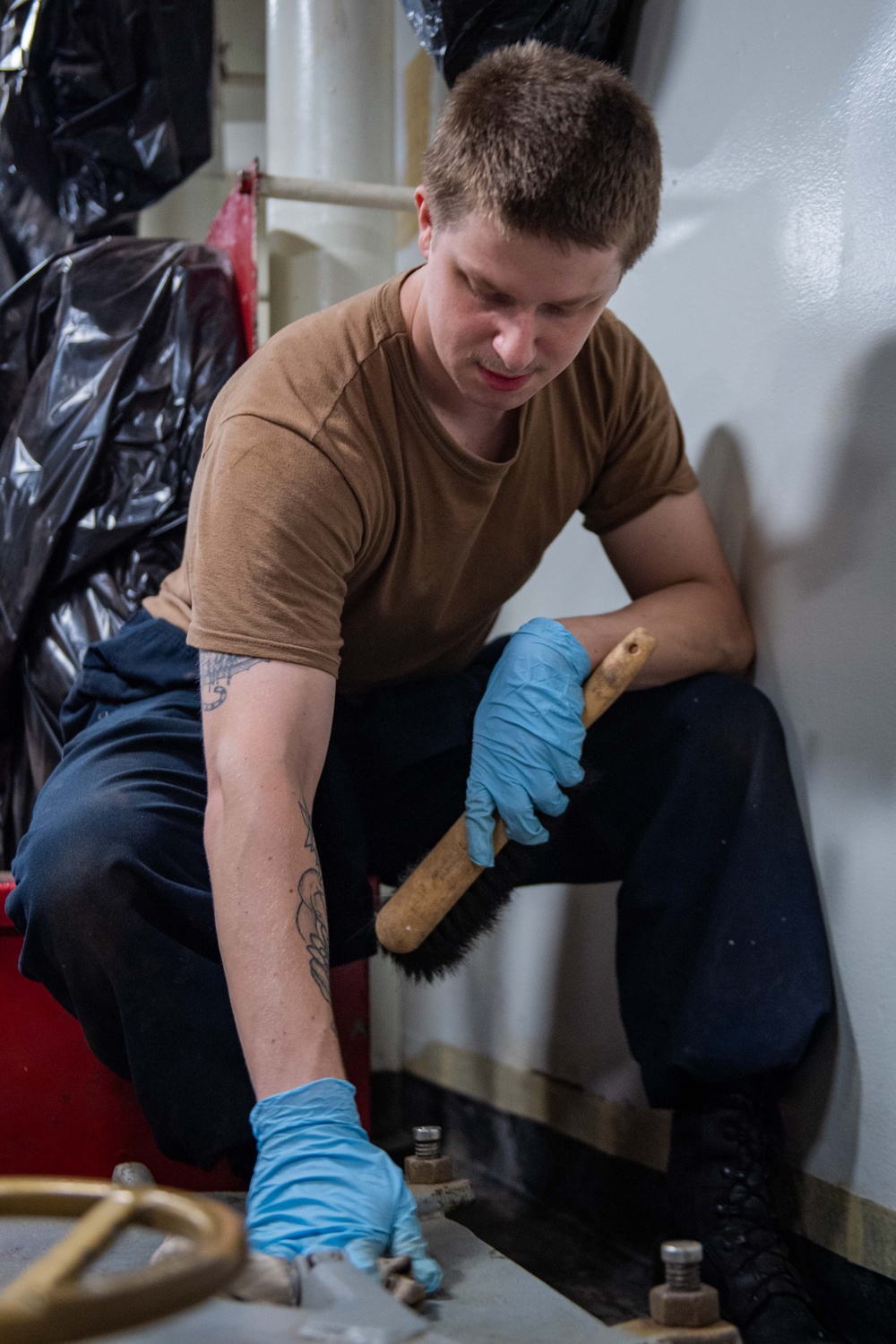 USS Ronald Reagan (CVN 76) Sailors preserve spaces