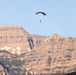 Soldiers with the 19th Special Forces Group (Airborne) parachute into Deer Creek Reservoir near Heber City, Utah
