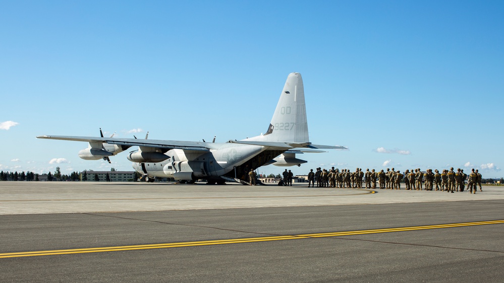 VMGR-152 and 11th Airborne Division execute static line jumps