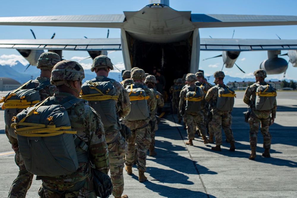 VMGR-152 and 11th Airborne Division execute static line jumps