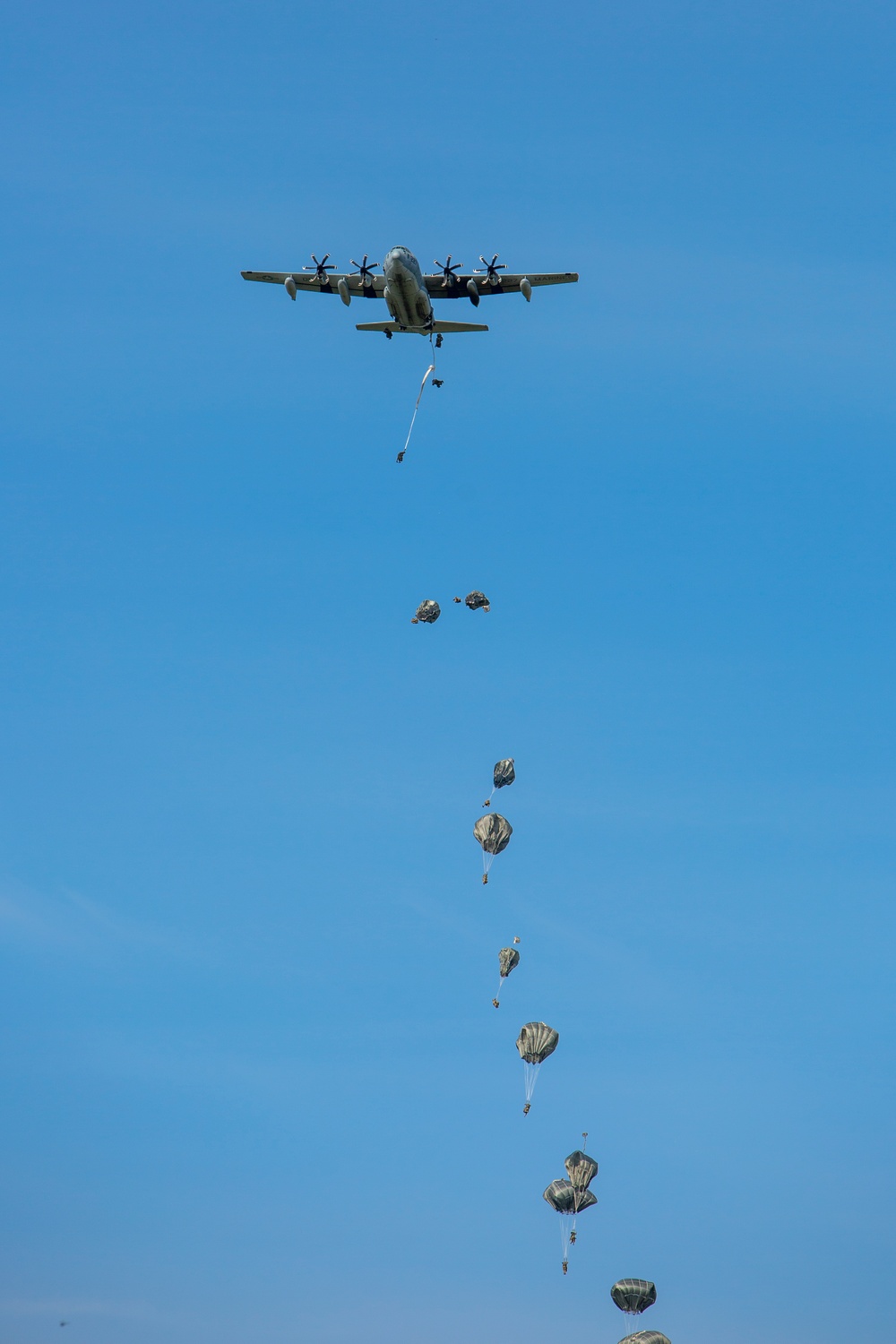 VMGR-152 and 11th Airborne Division execute static line jumps