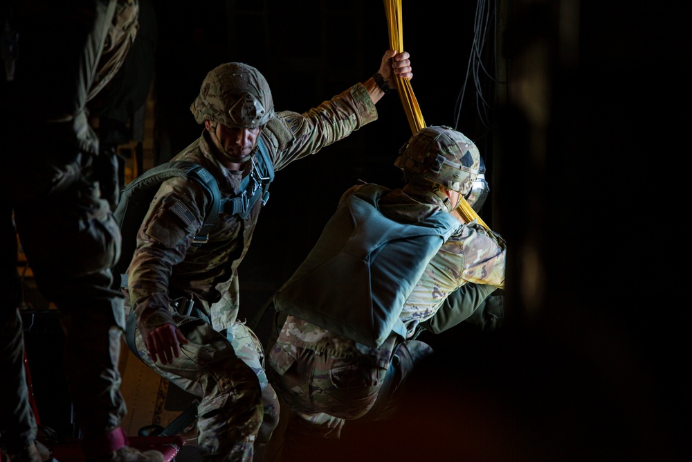 VMGR-152 and 11th Airborne Division execute static line jumps