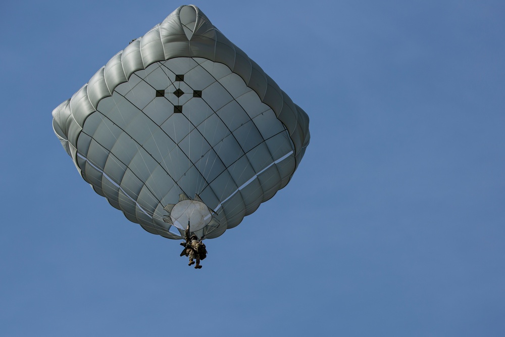 VMGR-152 and 11th Airborne Division execute static line jumps