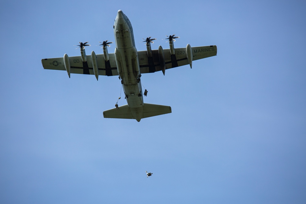 VMGR-152 and 11th Airborne Division execute static line jumps