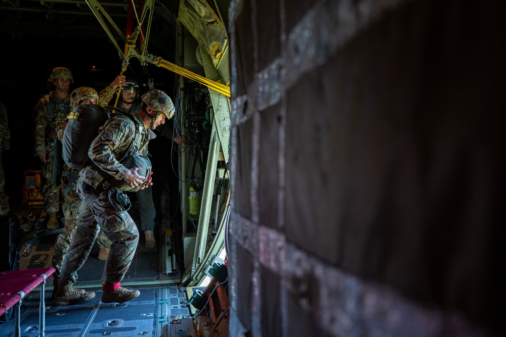 VMGR-152 and 11th Airborne Division execute static line jumps