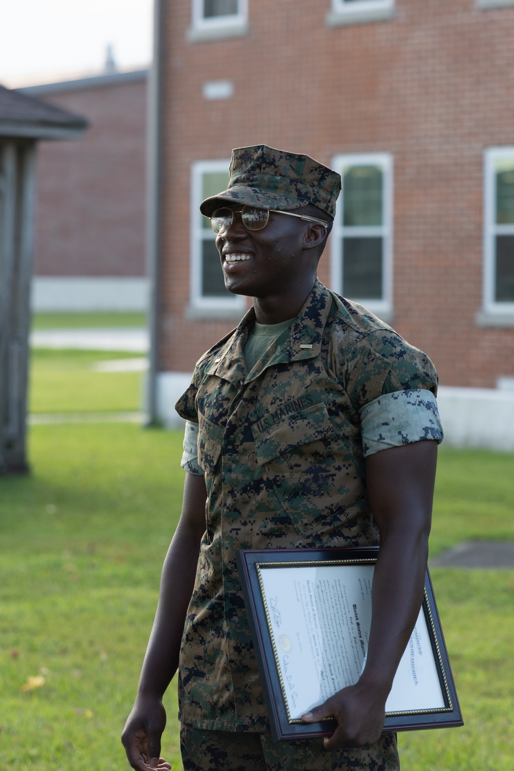U.S. Marine Corps Lance Cpl. Robert Kiffs promoted to corporal and commissioned as a second lieutenant