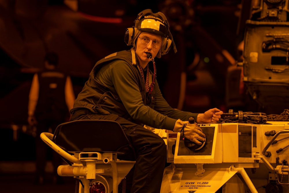 USS Carl Vinson (CVN 70) Sailor Taxis An MH-60S Sea Hawk