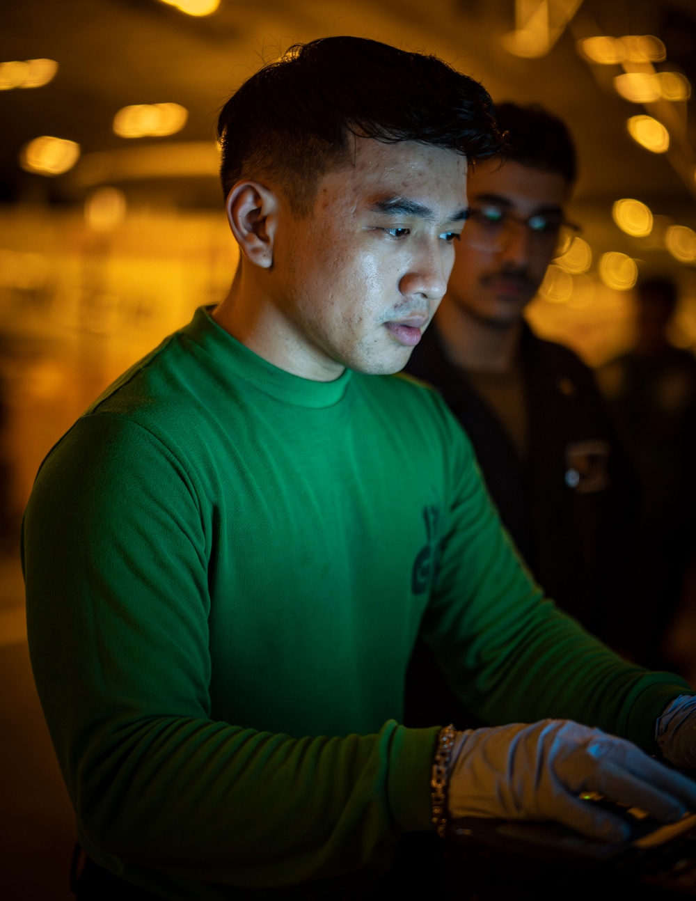 USS Carl Vinson (CVN 70) Sailor Conducts Routine Maintenance