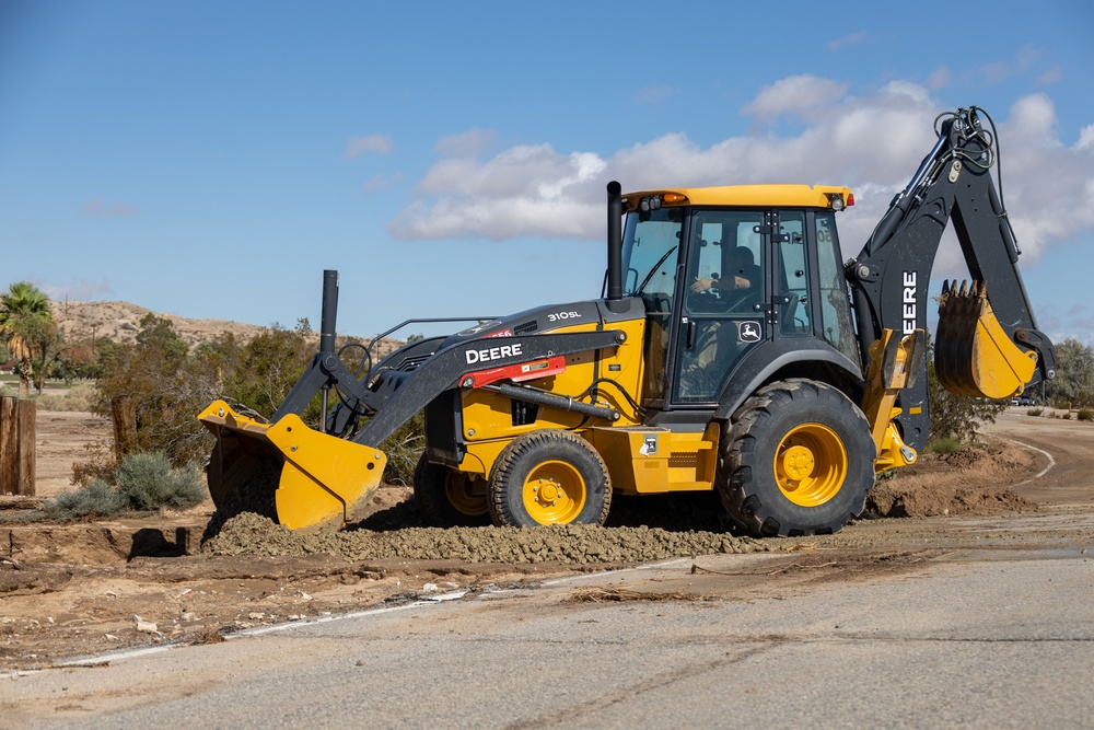 The Combat Center Public Works Division clear up debris after Tropical Storm Hilary