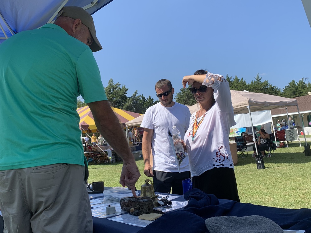 Visitors stop by Naval Museum's outreach booth