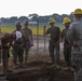 Marine Wing Support Squadron 272 works alongside Naval Mobile Construction Battalion 11 to conduct airfield damage repair