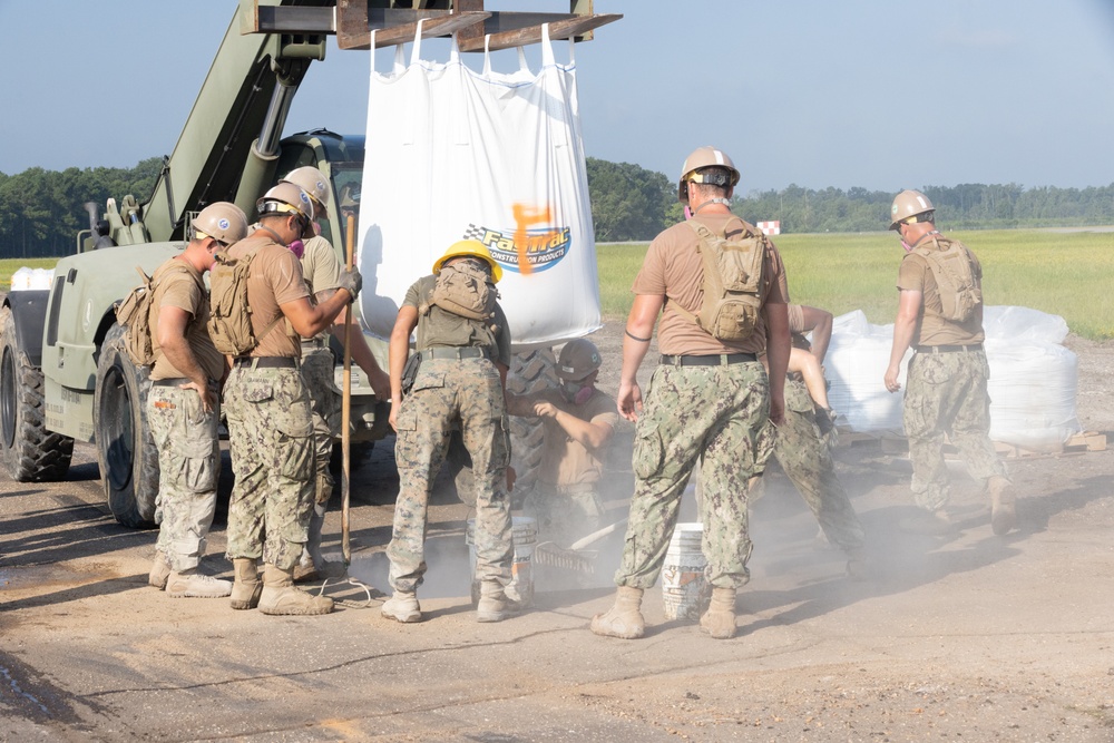 Marine Wing Support Squadron 272 works alongside Naval Mobile Construction Battalion 11 to conduct Airfield Damage Repair