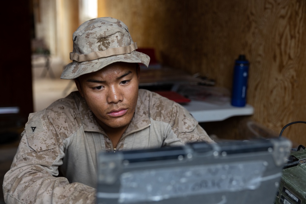 Marines with 3/7, 1st Combat Engineer Battalion defend an urban environment during AFX 5-23