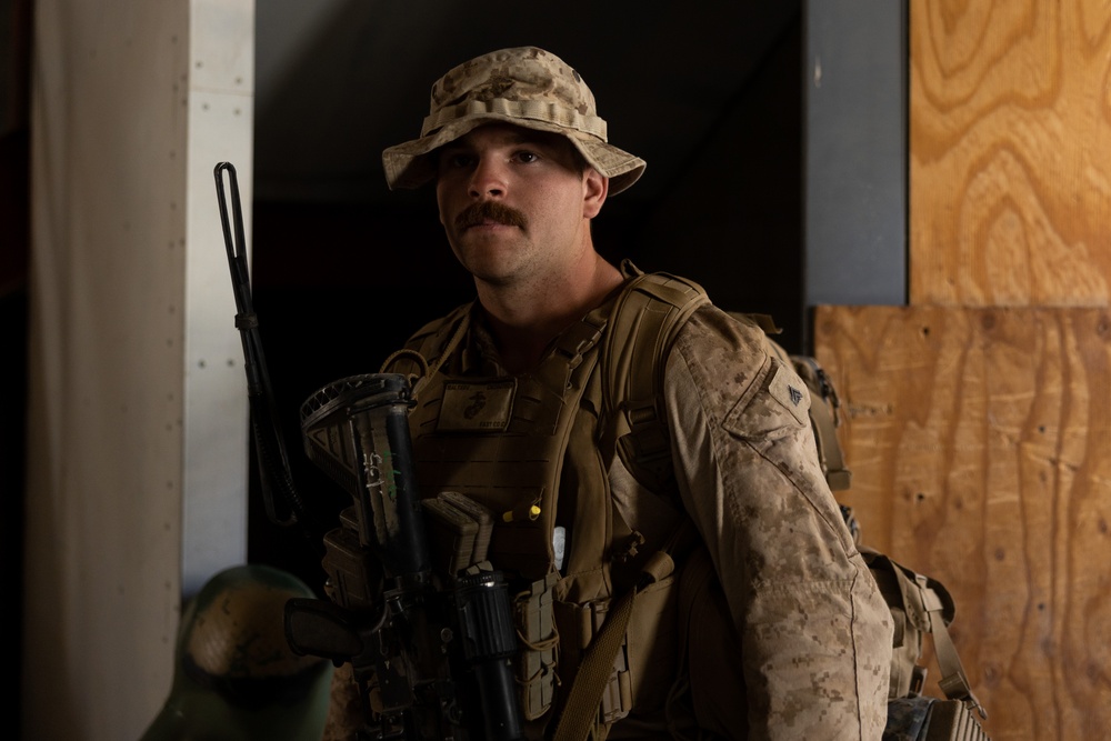 Marines with 3/7, 1st Combat Engineer Battalion defend an urban environment during AFX 5-23