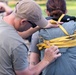 Soldiers with the 19th Special Forces Group (Airborne) parachute into Deer Creek Reservoir near Heber City, Utah