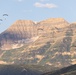 Soldiers with the 19th Special Forces Group (Airborne) parachute into Deer Creek Reservoir near Heber City, Utah