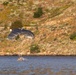 Soldiers with the 19th Special Forces Group (Airborne) parachute into Deer Creek Reservoir near Heber City, Utah