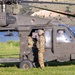 Soldiers with the 19th Special Forces Group (Airborne) parachute into Deer Creek Reservoir near Heber City, Utah