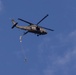 Soldiers with the 19th Special Forces Group (Airborne) parachute into Deer Creek Reservoir near Heber City, Utah