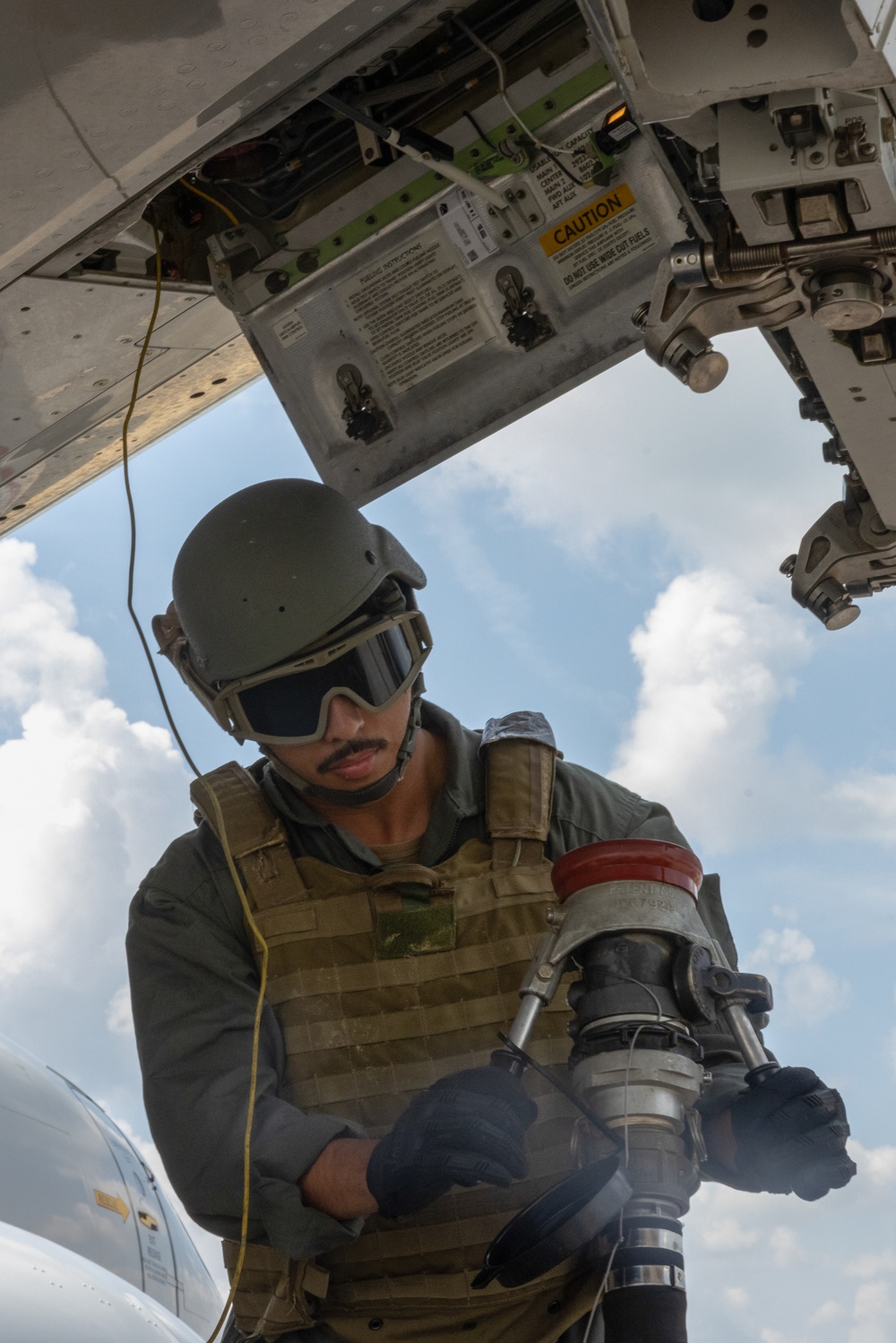 Large Scale Exercise 2023: U.S. Marines and Sailors operate a forward refueling point