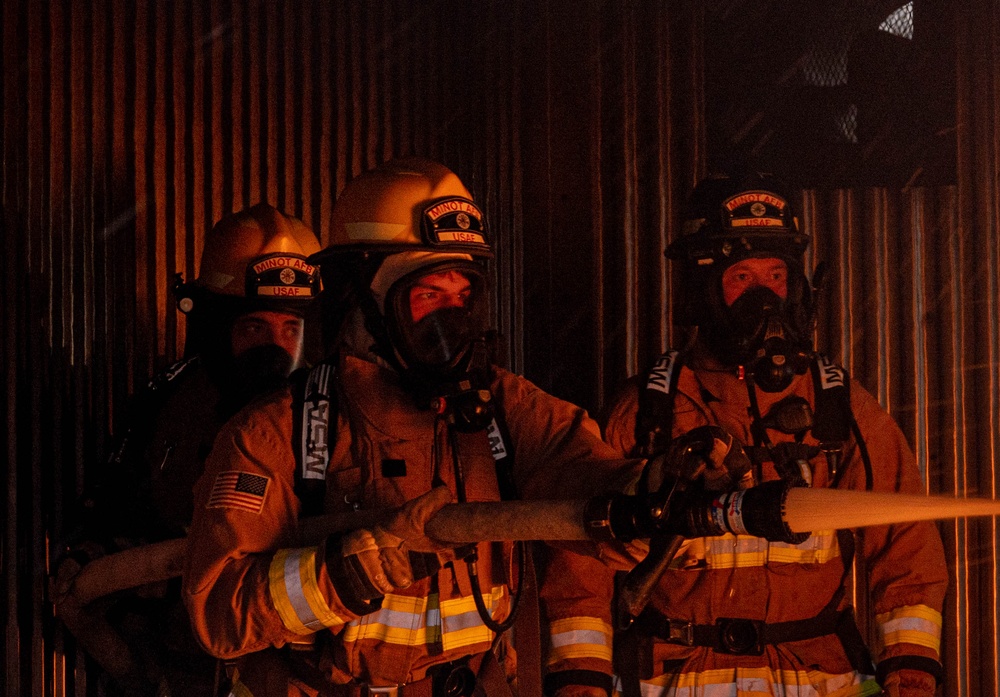 Team Minot live fire training with local Fire Department