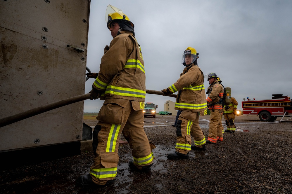 Team Minot live fire training with local Fire Department