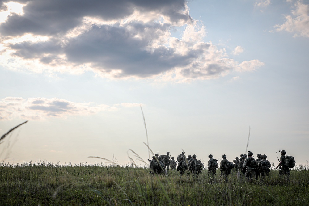 Paratroopers Conduct Load Up Onto Helicopter In Preparation For Air Assault