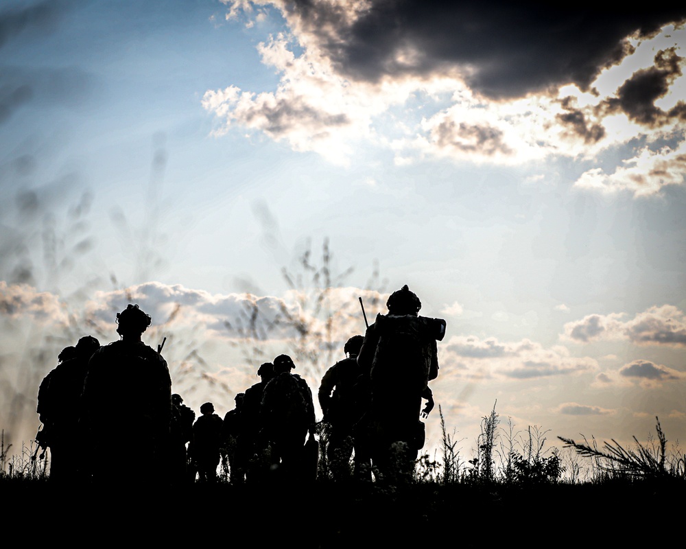 Paratroopers Conduct Load Up Onto Helicopter In Preparation For Air Assault