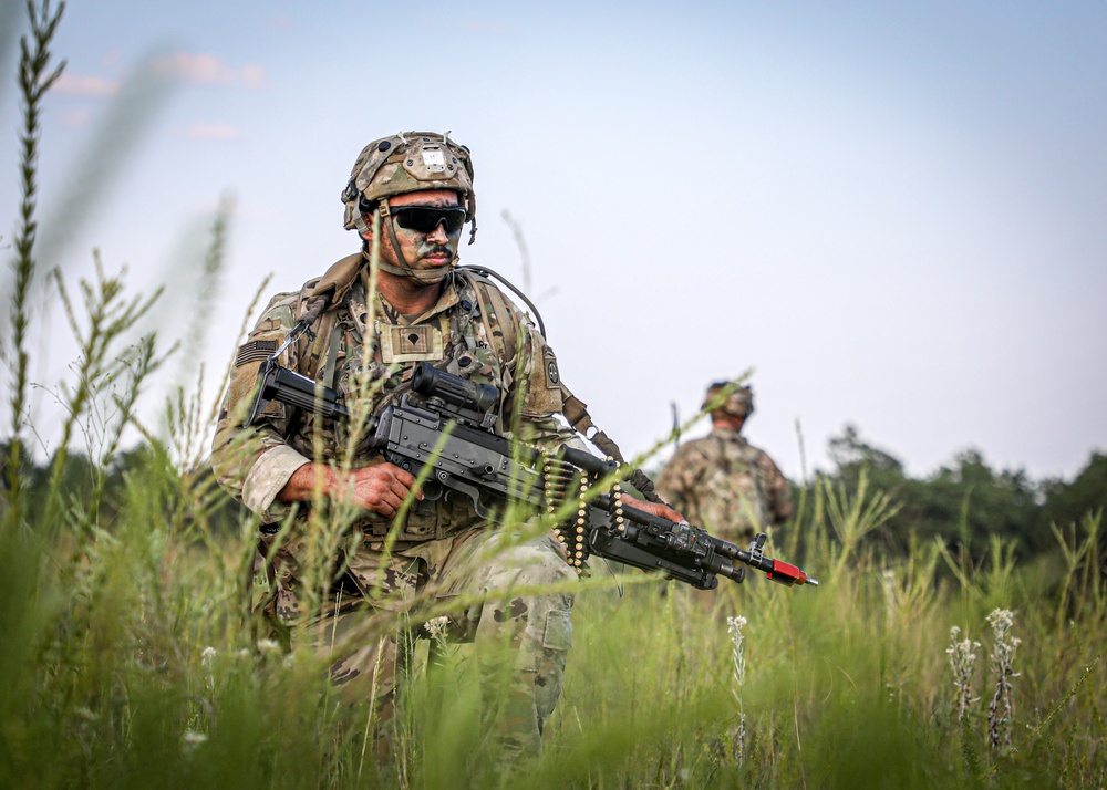 Paratroopers Conduct Load Up Onto Helicopter In Preparation For Air Assault